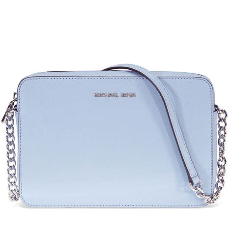 michael kors jet set travel tote pale blue|Michael Kors bag with airplanes.